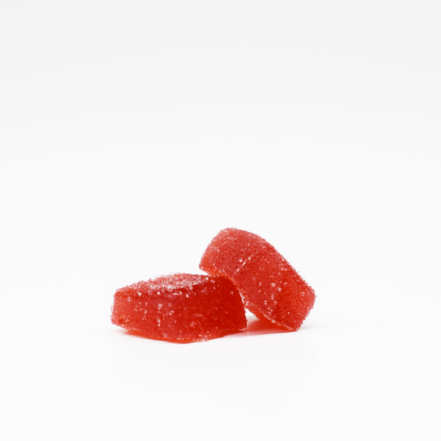 JOLLY 1:25 THC:CBD Strawberry Gummies. Red, square, sugar coated gummies