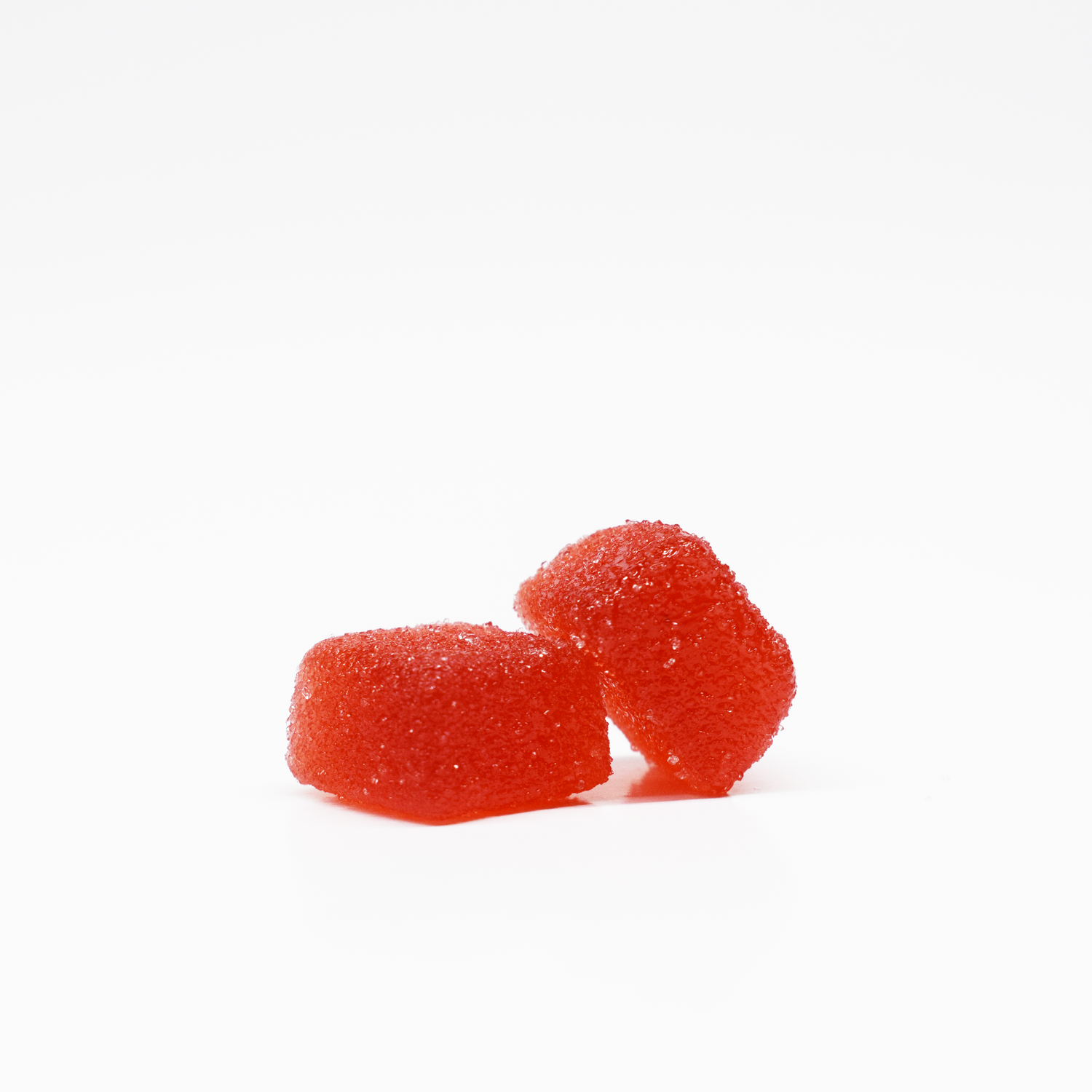 JOLLY 1:1 THC:CBD Strawberry Watermelon Gummies. Red, square, sugar coated gummies